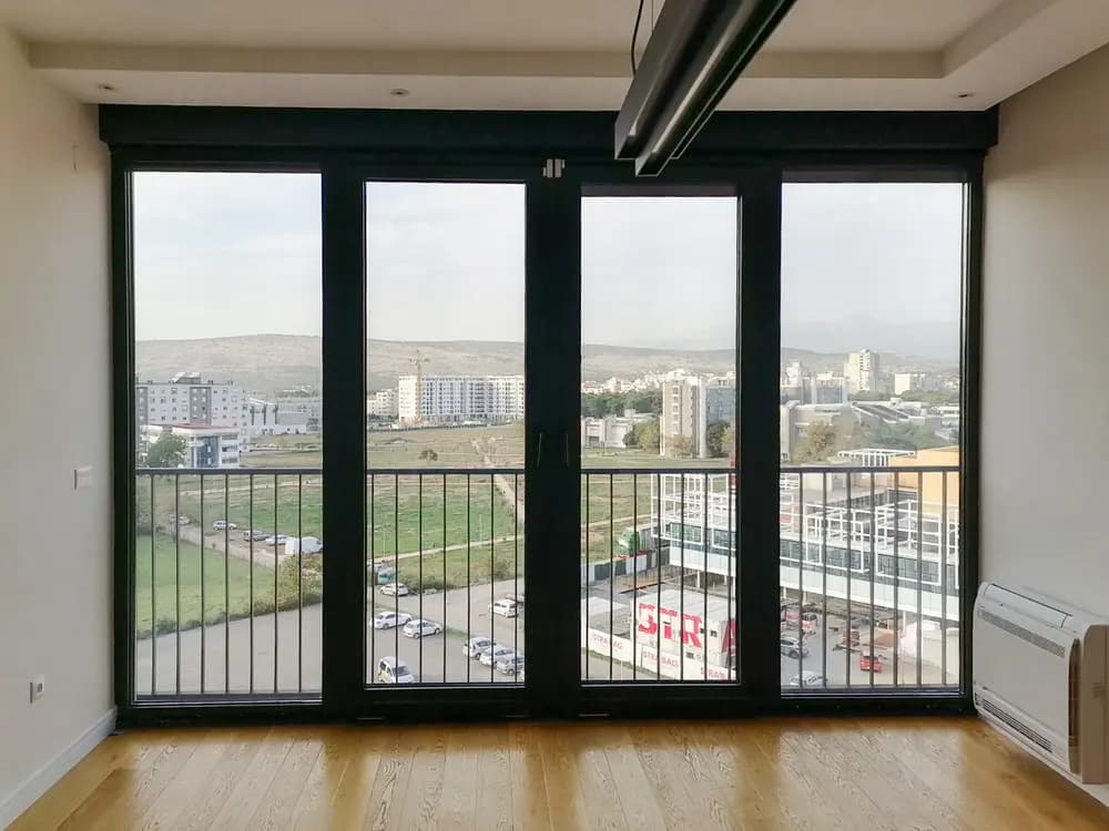 Non-reflective solar control window film on a window — 6