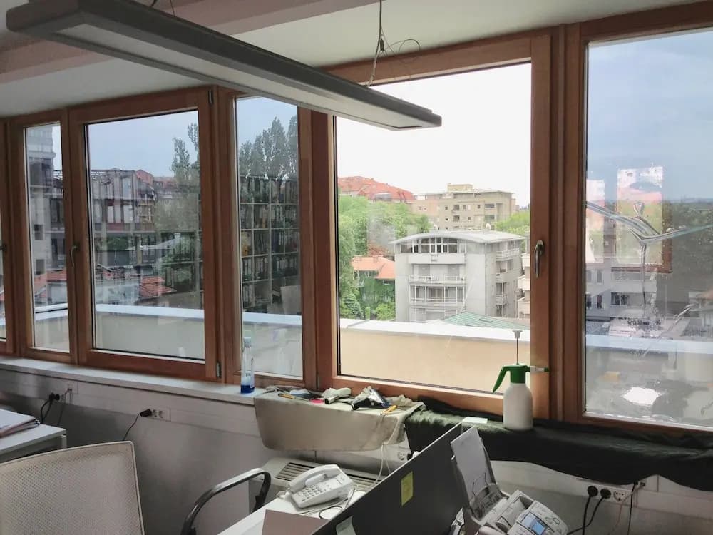 Non-reflective solar control window film on a window — 13